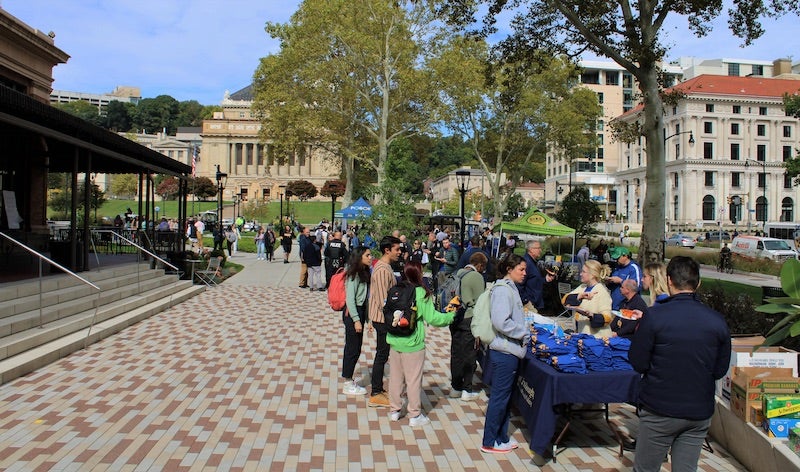 safety fair tables and people outside of the WPU