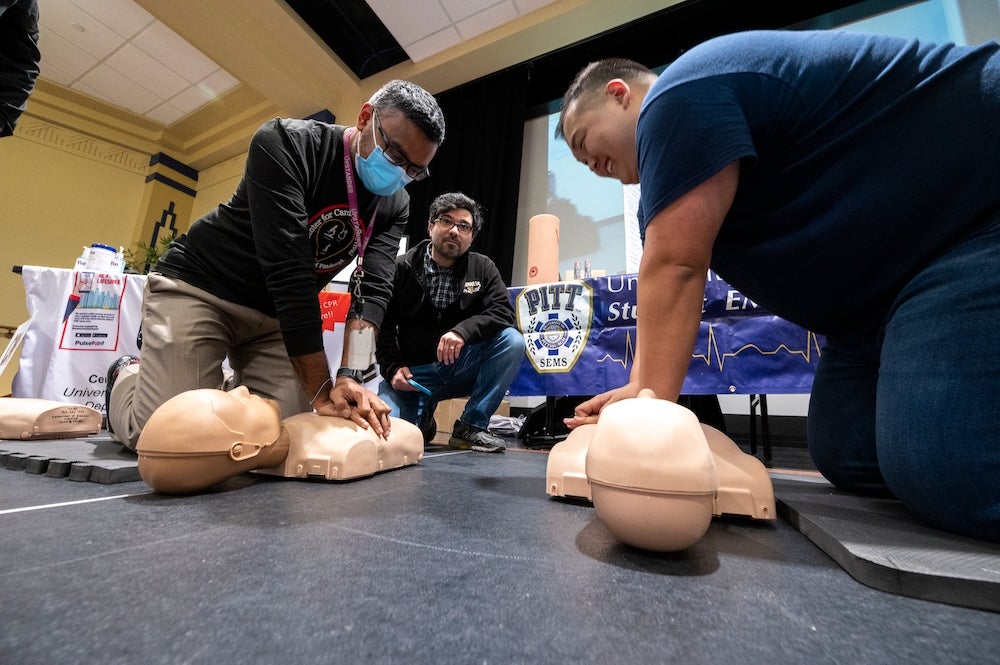 people doing CPR