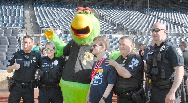 The Pirate Parrot posing with people