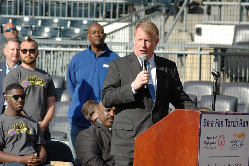 Person speaking at a podium in PNC park