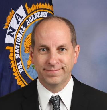 Commander Kiefer's official headshot from FBI National Academy